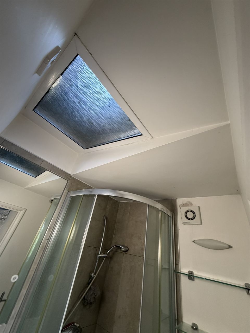Shower room ceiling clean after mould treatment